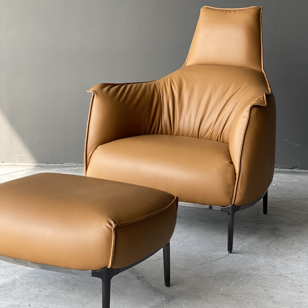 A Morden take on the classic grandma chair. Upholstered in genuine leather, the Rimabalzo is a perfect Accent chair for your bedroom or the family lounge to unwind in unmatched comfort and luxury.
- genuine leather Upholstery
- nickel metal legs
- comes with a matching pouf
- upholstery options available in store
ENQUIRE NOW